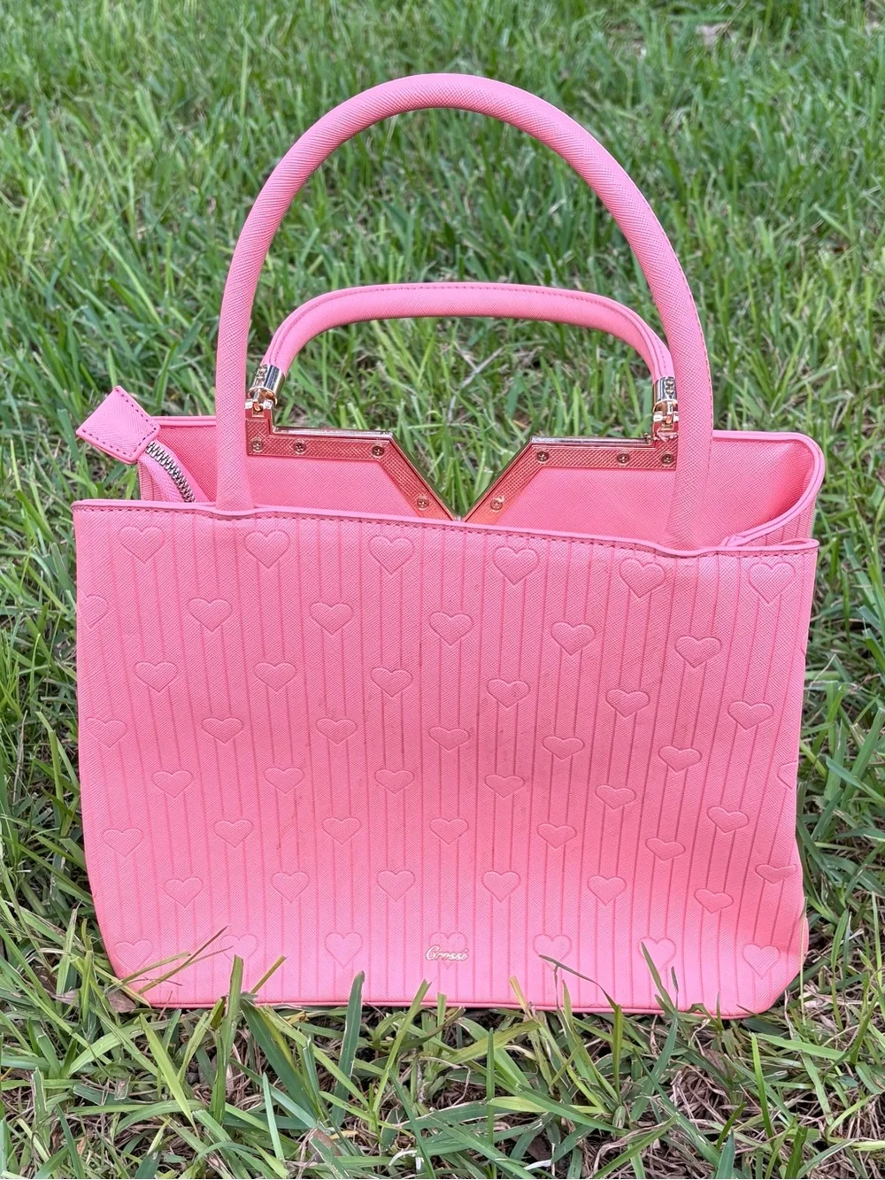 Crossi Pink Structured Heart-Embossed Tote Bag with Tassel Charm